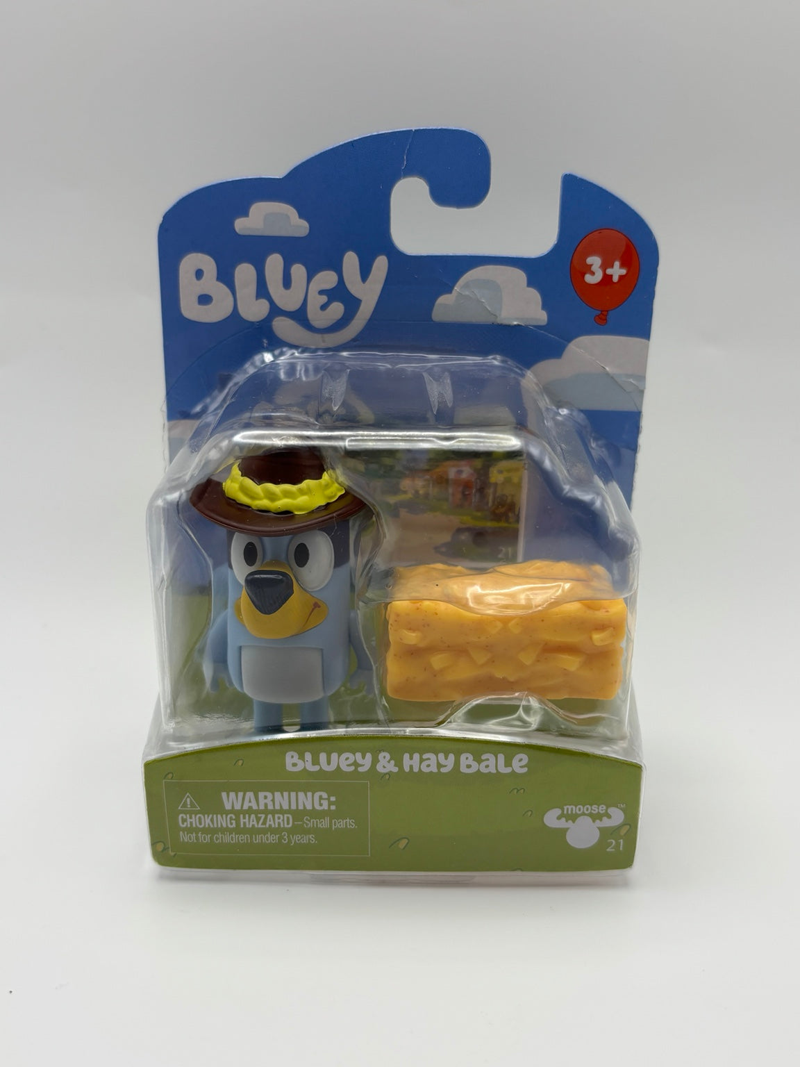 Moose Toys Bluey and Hay Bale figure with hat and hay bale accessory in packaging