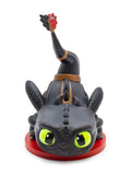 CultureFly FlyGuys Toothless lying down on a red base with his tail raised