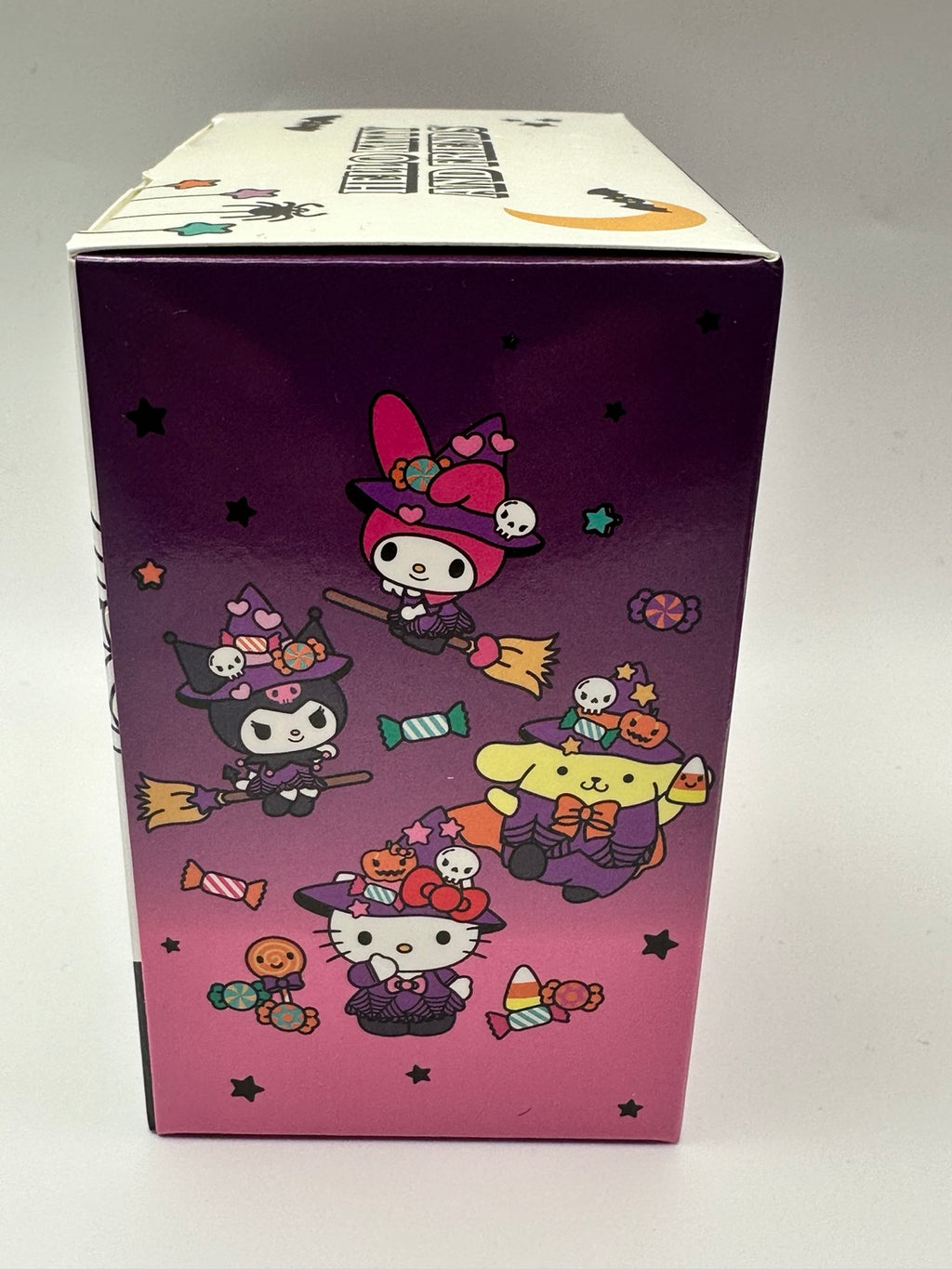 Side packaging artwork for Hello Kitty and Friends Halloween Nerd Gnomes