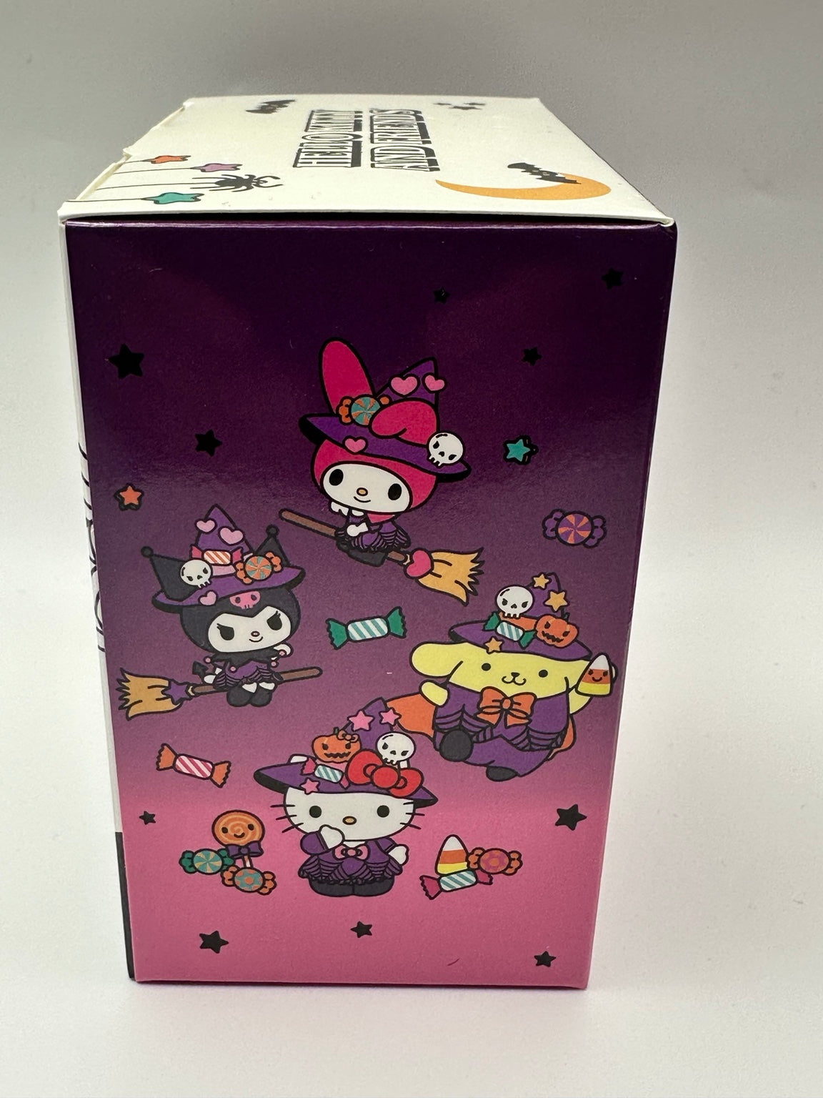 Side packaging artwork for Hello Kitty and Friends Halloween Nerd Gnomes