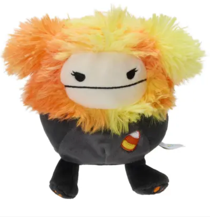 Roxanne the Sasquatch Squishmallow 5 inch Halloween plush with orange yellow shaggy fur and candy corn front view
