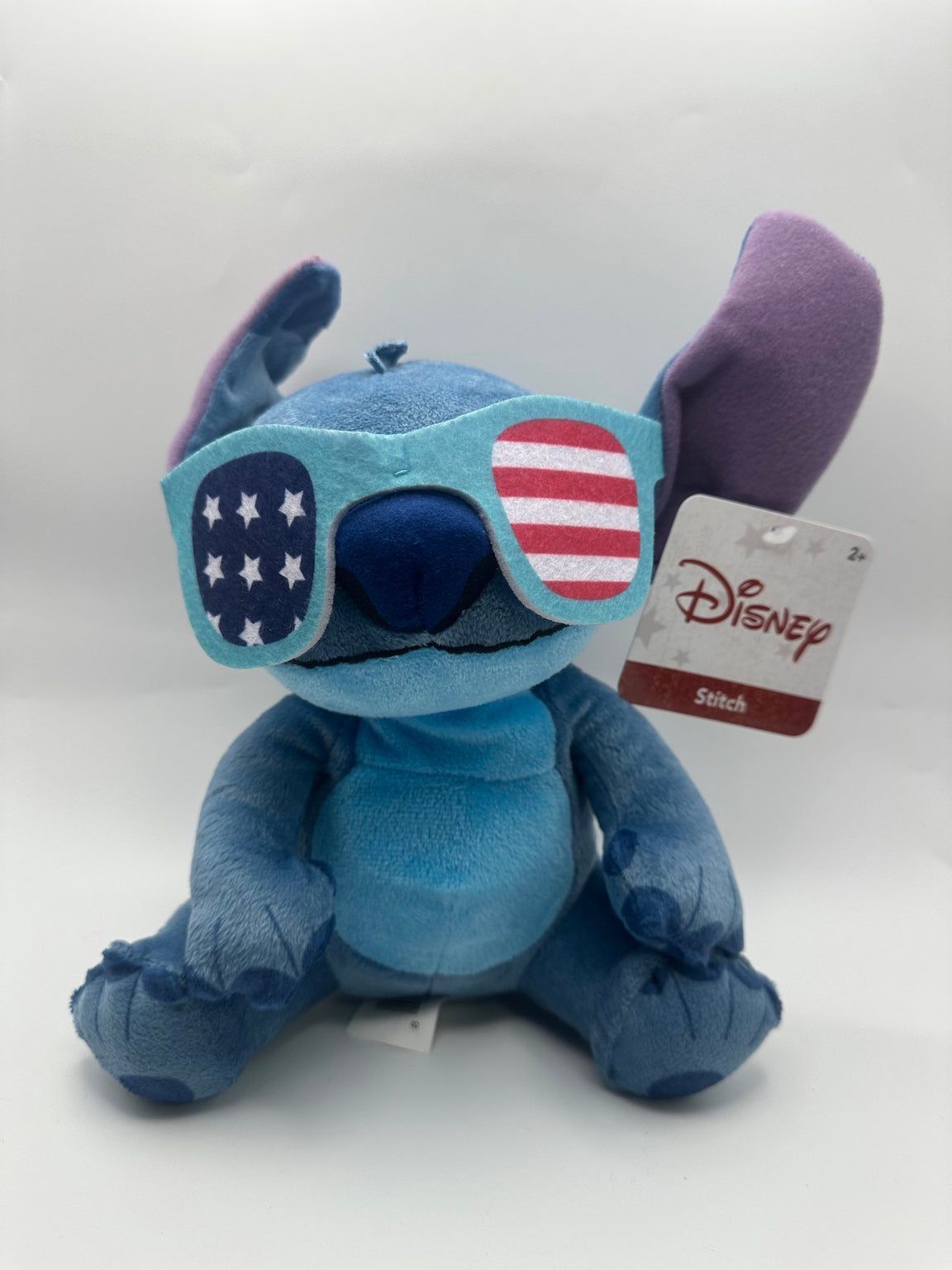 Just Play Disney Stitch plush wearing American flag sunglasses