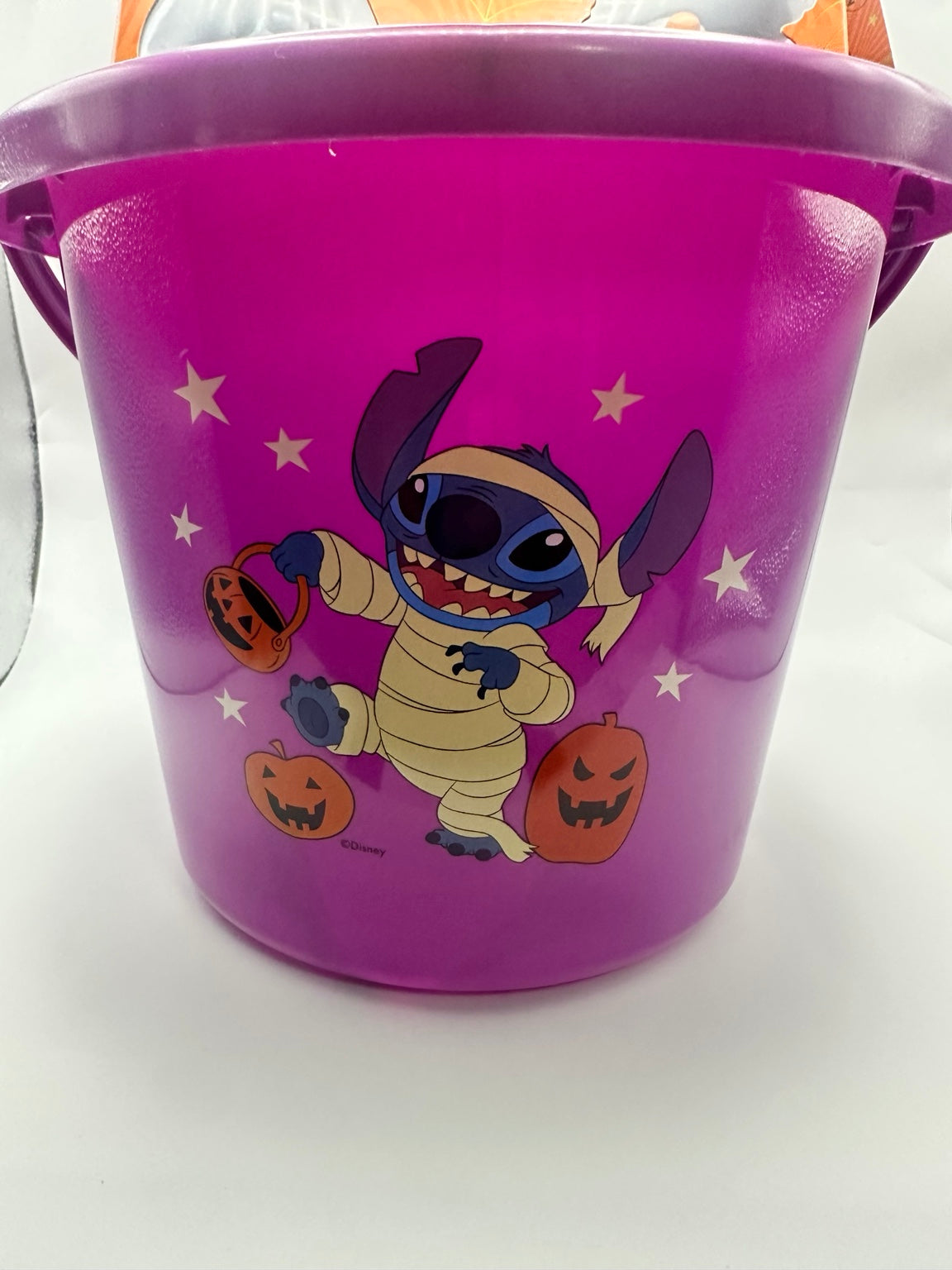 Purple Halloween bucket with mummy Stitch and pumpkin artwork
