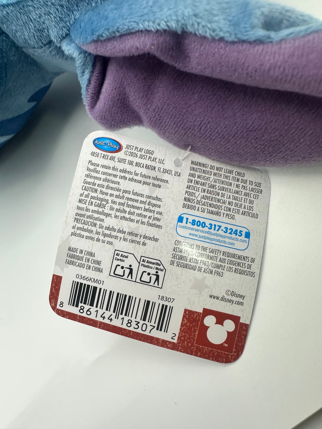 Just Play manufacturer label on the included patriotic Stitch plush