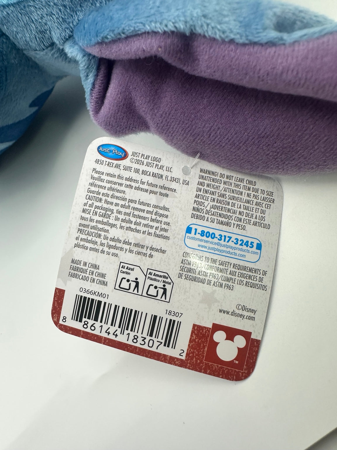 Just Play manufacturer label on the included patriotic Stitch plush