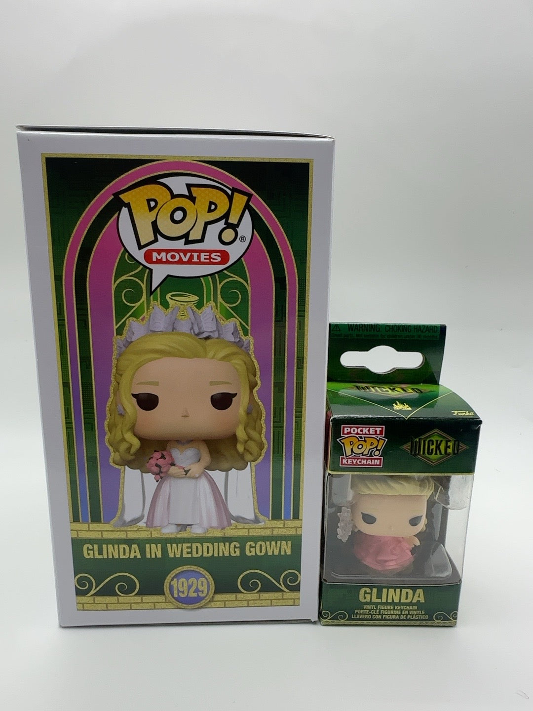 Side of Glinda in Wedding Gown Pop number 1929 box alongside the boxed Glinda keychain